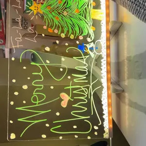 Customer photo of Merry Christmas written on the glowing board